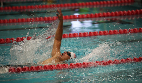 Man-swimming-in-a-pool